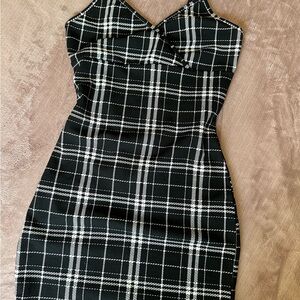 { Plaid V-neck mini dress }